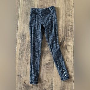 Athleta Girl black, white and grey striped leggings